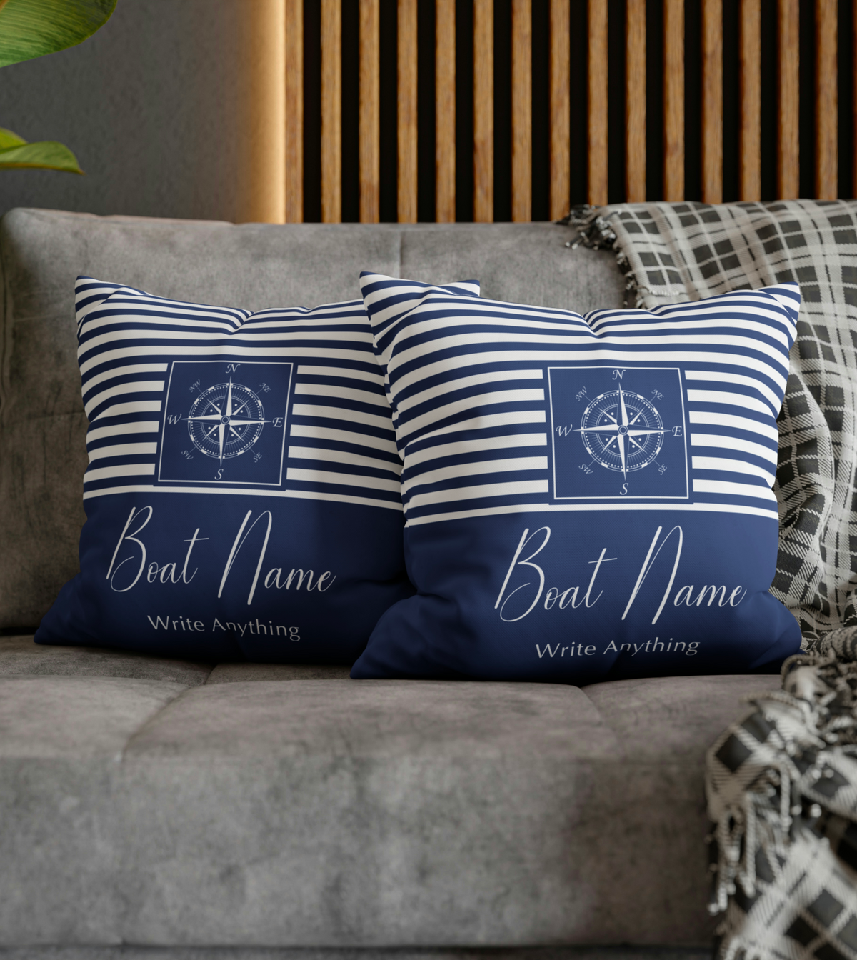 Personalized Water-Resistant Outdoor Pillow with Custom Boat Name displayed on a wooden deck. This square pillow, perfect for yacht, boat, pontoon, ship, or cruise owners, features a water-resistant material and a nautical design with an anchor and a compass. The pillow is customized with a boat name, making it a unique and personal accessory for maritime enthusiasts. Ideal for boat parties, summer outings, or as a unique gift for boat owners and sailing enthusiasts.