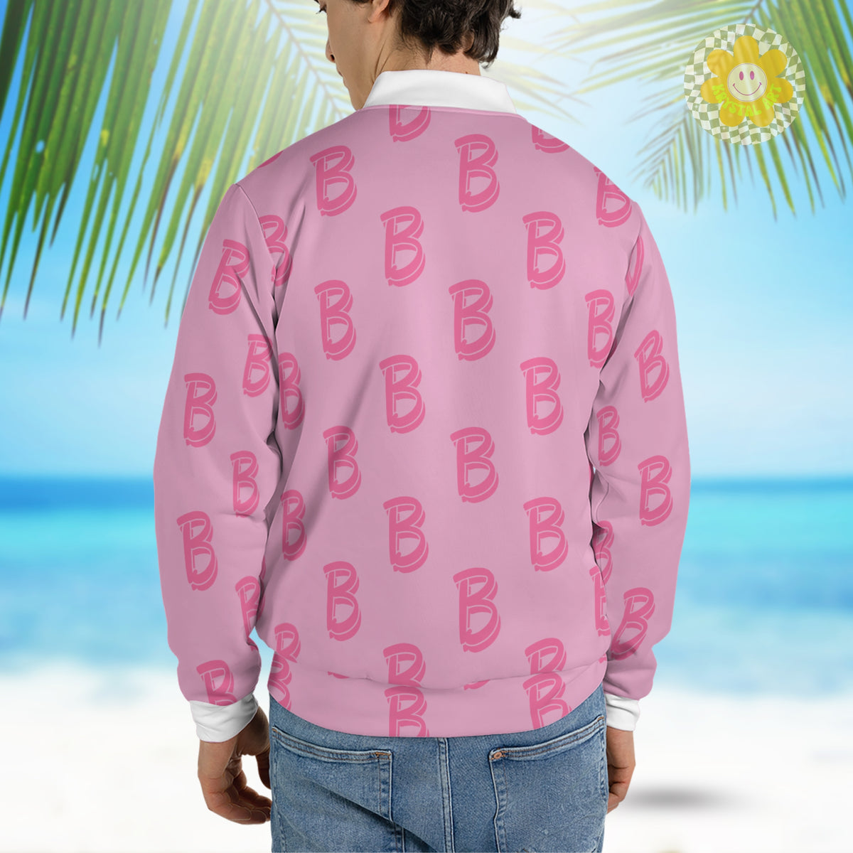 A stylish bomber jacket featuring a vibrant pink background with a bold 'B' letter pattern, reminiscent of Ken from the Barbie movie. The jacket has a classic varsity design, complete with ribbed cuffs and collar.