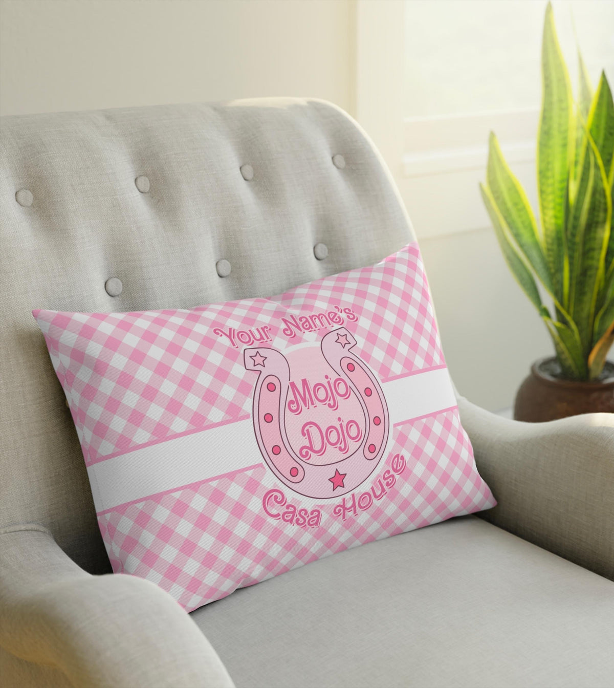 Pastel pink Mojo Dojo Casa House pillow with Barbiecore design elements, featuring a customizable name section in bold white font