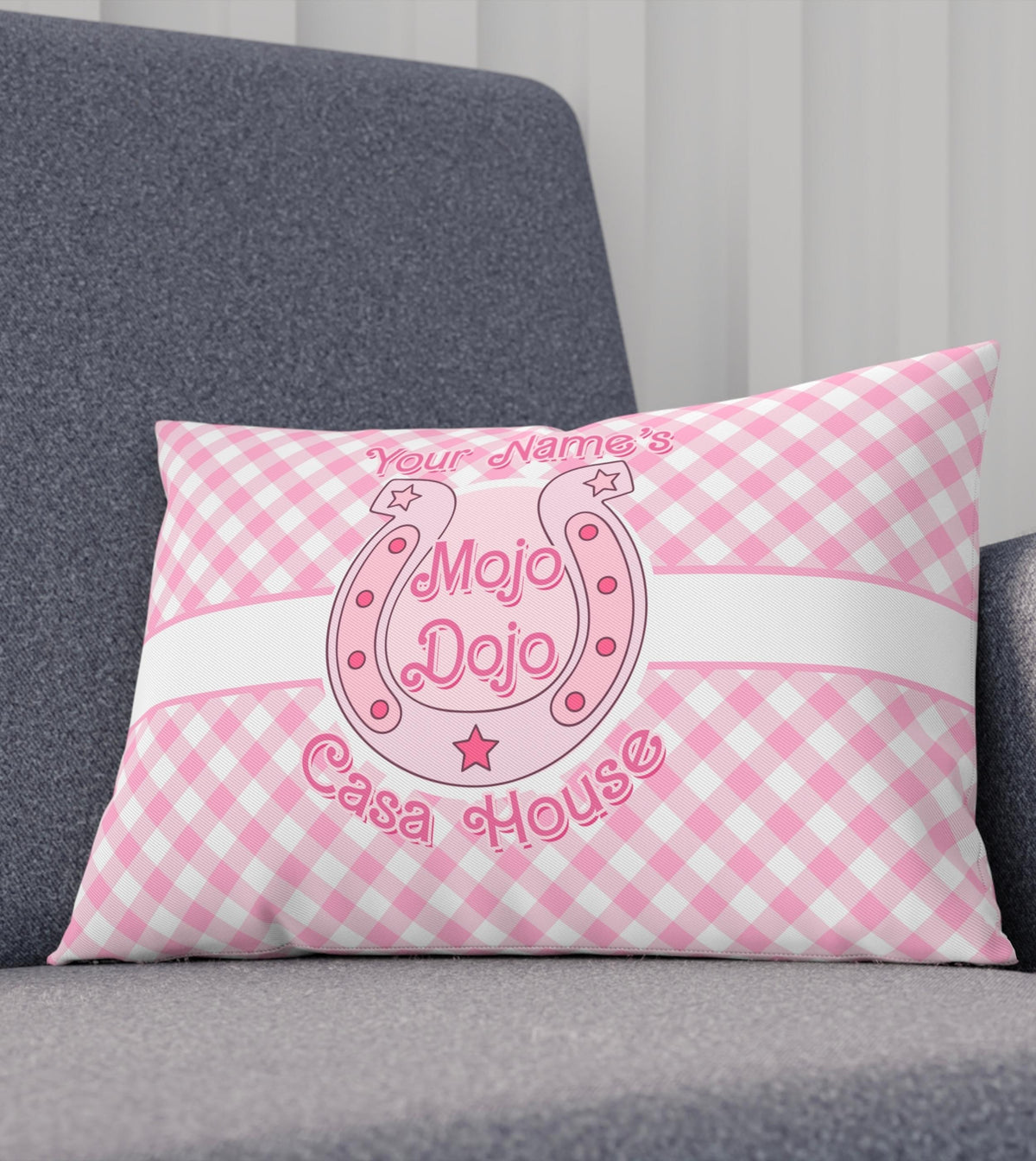 Pastel pink Mojo Dojo Casa House pillow with Barbiecore design elements, featuring a customizable name section in bold white font