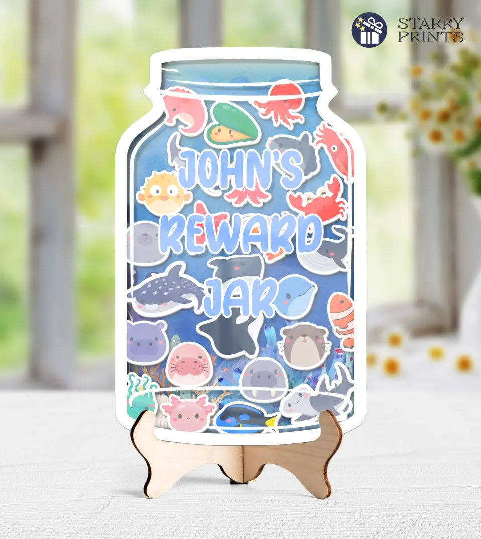 Personalized reward jar with vibrant ocean animal tokens, customizable name, and a clear jar against a white background - educational and motivational children's behavior tracking tool.