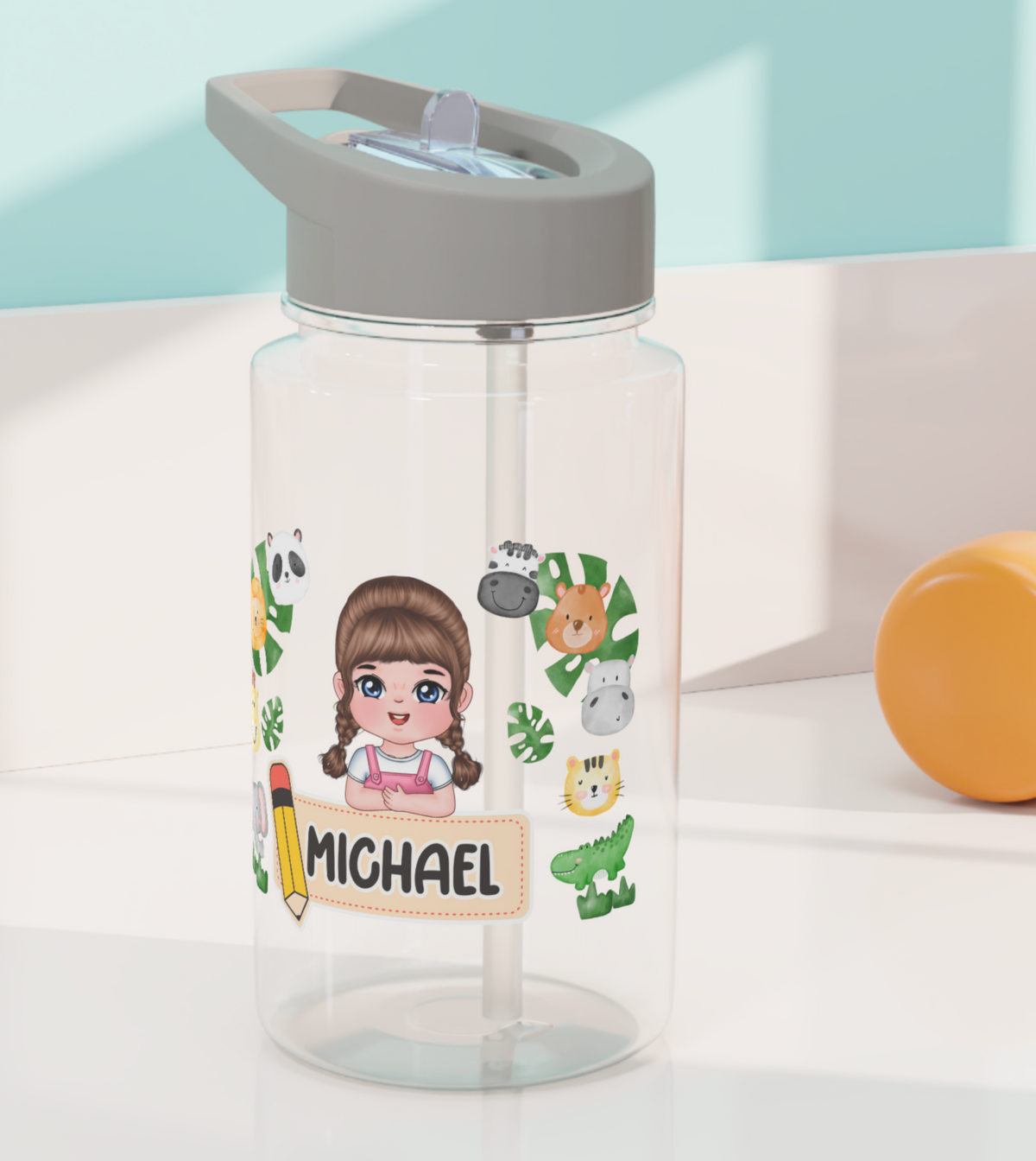 A personalized water bottle for kids with a screw-on lid and straw, made of biodegradable corn starch material and available in various colorful backgrounds and clipart designs.