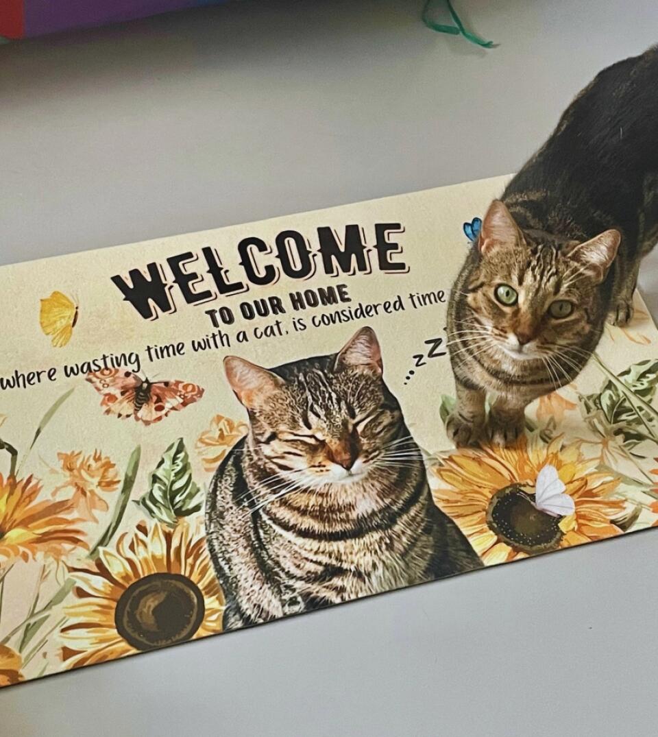 A personalized 'Welcome To Our Purrfect Home' doormat featuring a custom photo of a pet and the pet's name. This unique doormat is a fun and practical addition to any pet lover's home.