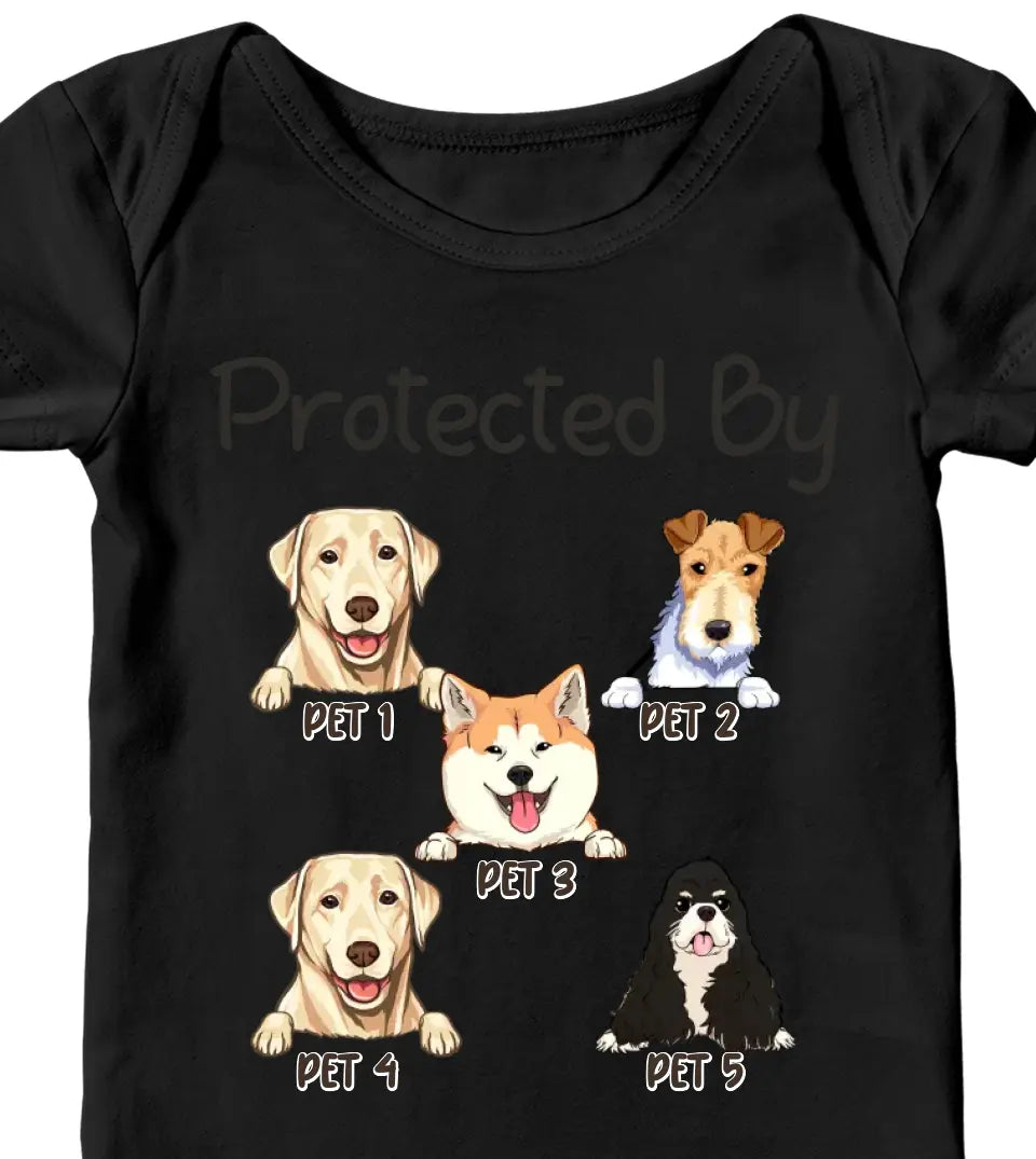 A white baby onesie with a quote "Protected by" followed by a portrait of a dog or cat and their name printed on it.