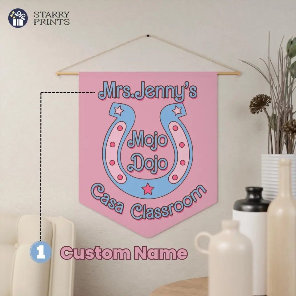 Pastel pink classroom pennant featuring 'Mojo Dojo Casa' text, personalized with a teacher's name, adorned with stars and a horseshoe design, reflecting a Barbiecore aesthetic.