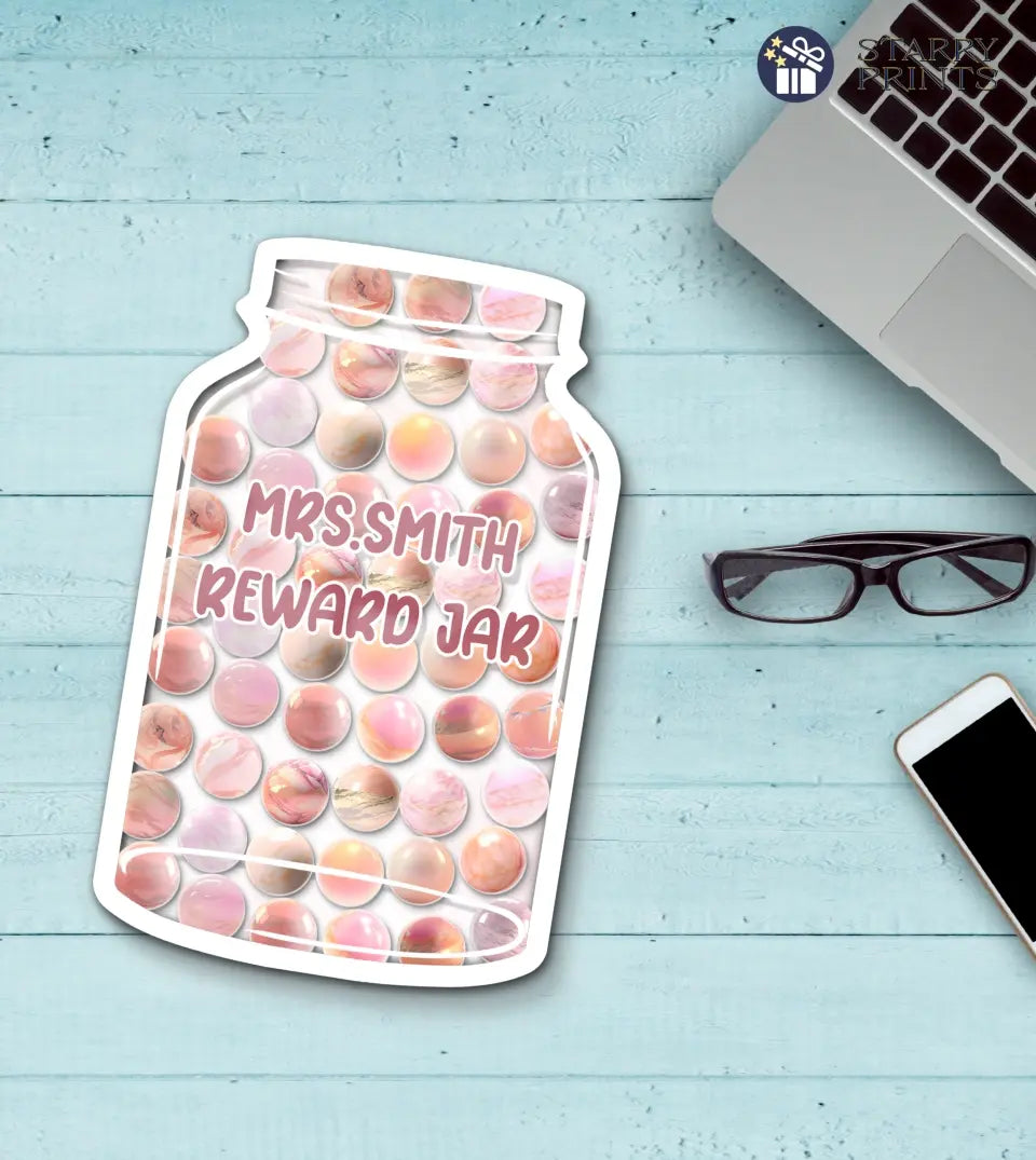 This product is a personalized pastel marble reward jar designed for classroom goal tracking and as a behavior reward for kids. It's a unique and engaging way to motivate children in a classroom setting. The jar can be customized with the child's name, making it a personal and special reward system.