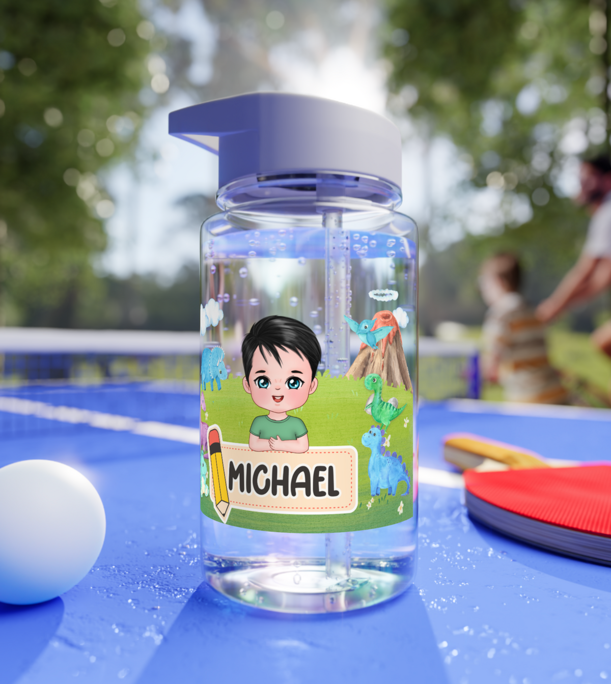 A personalized Tritan water bottle for kids, featuring a bright and colorful design on a biodegradable bottle with a screw-on lid and foldable straw.