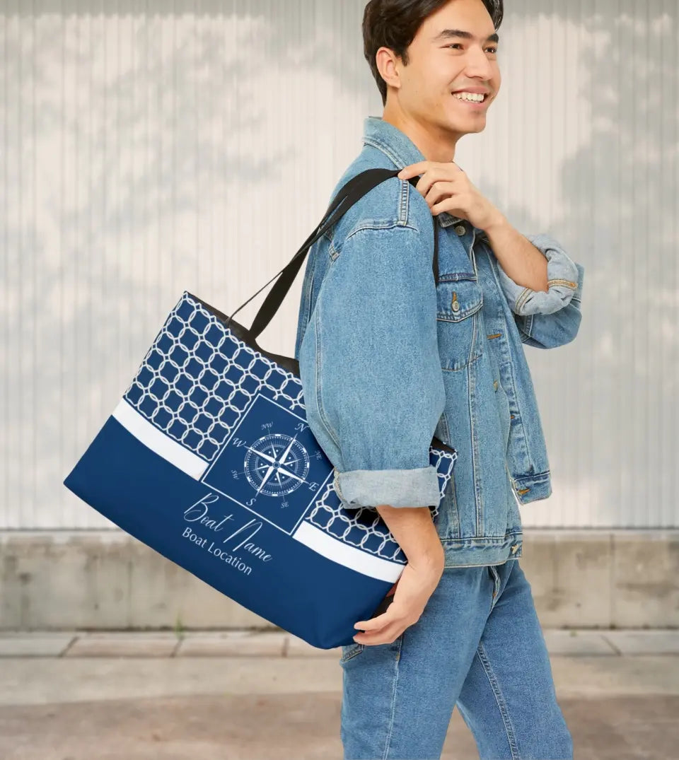 Personalized Nautical Tote Bag featuring a custom boat name and compass design on a striped background. The bag is spacious, perfect for boat trips, beach activities, and weekend getaways. It's a unique gift for boat owners and sailing enthusiasts